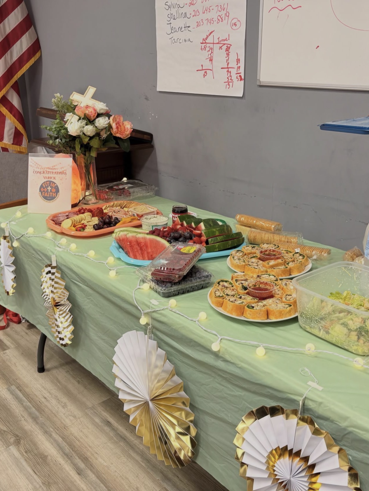 A celebration table decorated for the end of a Fit in Faith program