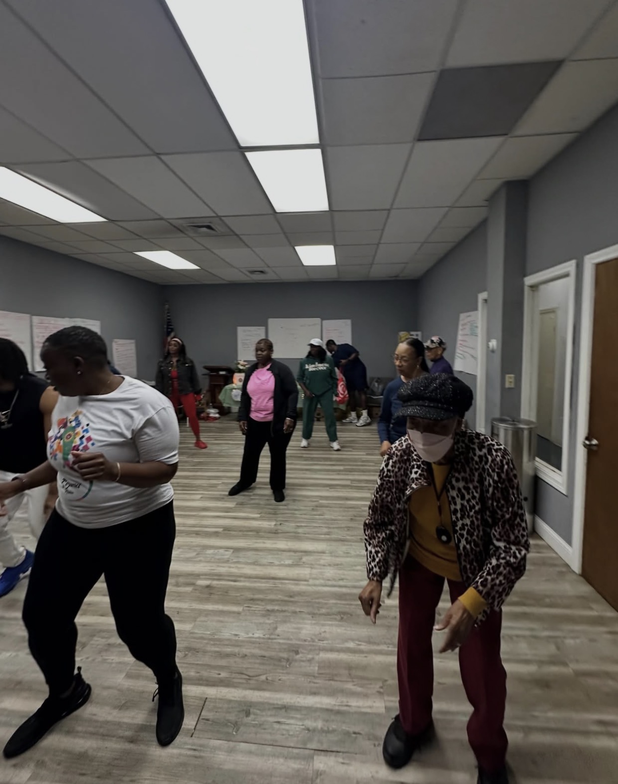 Members dancing together during a workshop session
